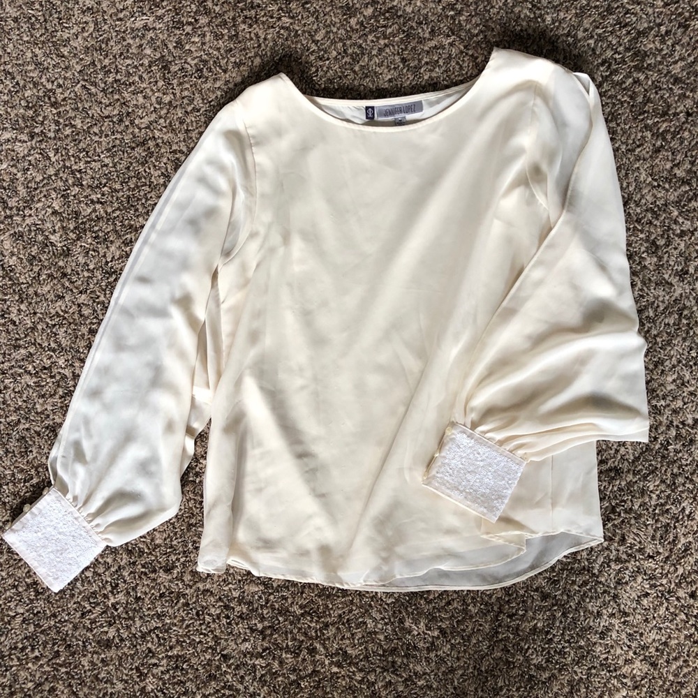 White open sleeved top